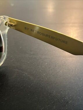 RetroSuperFuture Clear Frame Sunglasses with Gold Arms